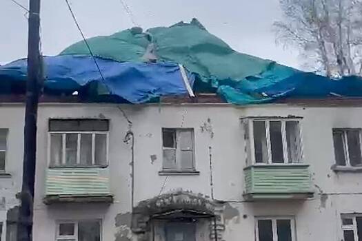 In a city in Russia, the leaky roof was covered with rags